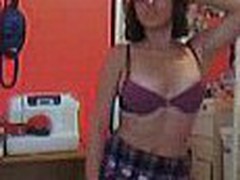 Sexy dark brown all natural amateur girl stripping down in her little room on her webcam.